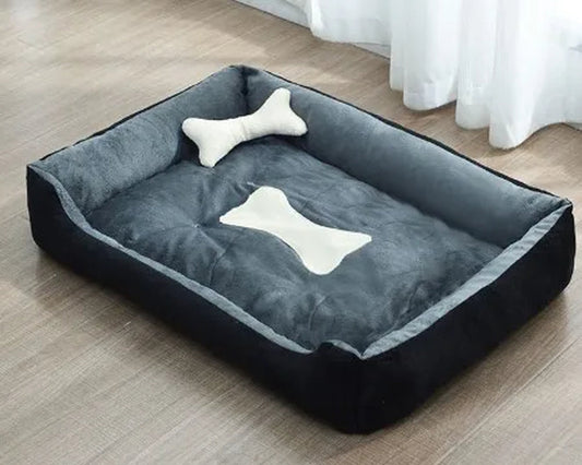 Cozy and washable plush pet bed with removable cover and bone-shaped cushions for large dogs.